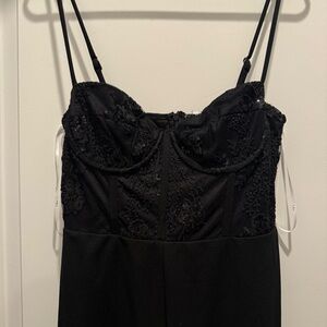 Lulu’s Black Lace Bustier Jumpsuit Romper